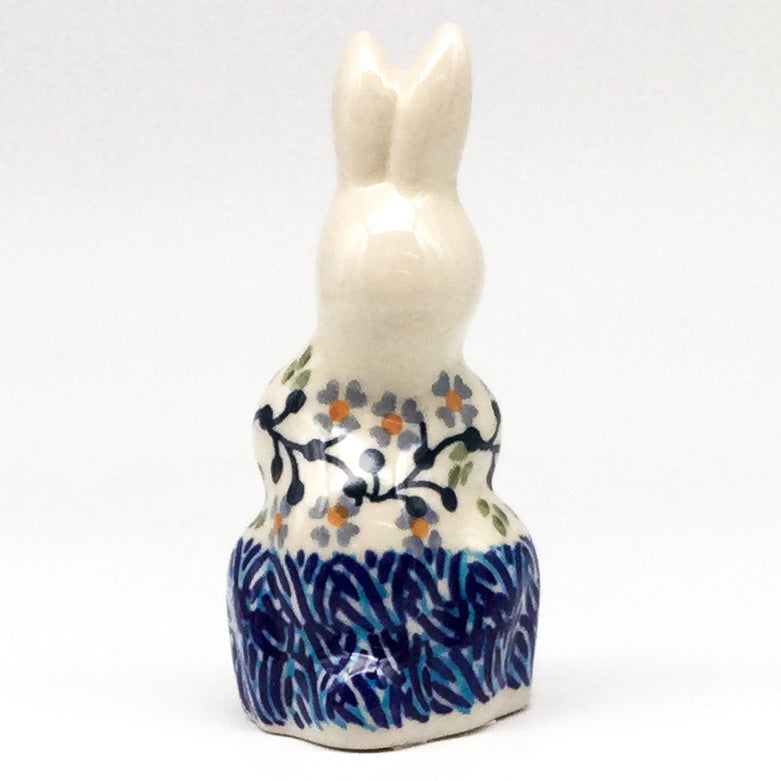 Bunny Holding Easter Egg-Miniature in Blue Meadow